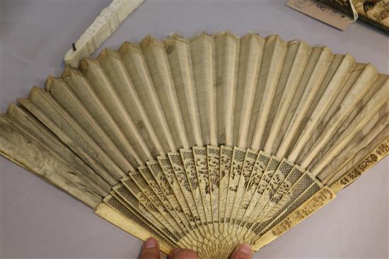 Two Chinese ivory fans and an embroidered fan case